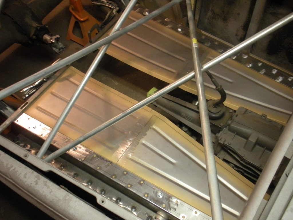 A metal structure with some wood on it