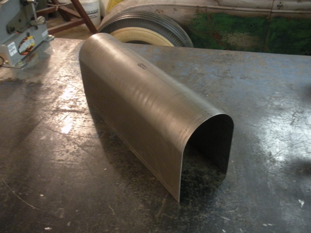 A metal object sitting on top of a table.