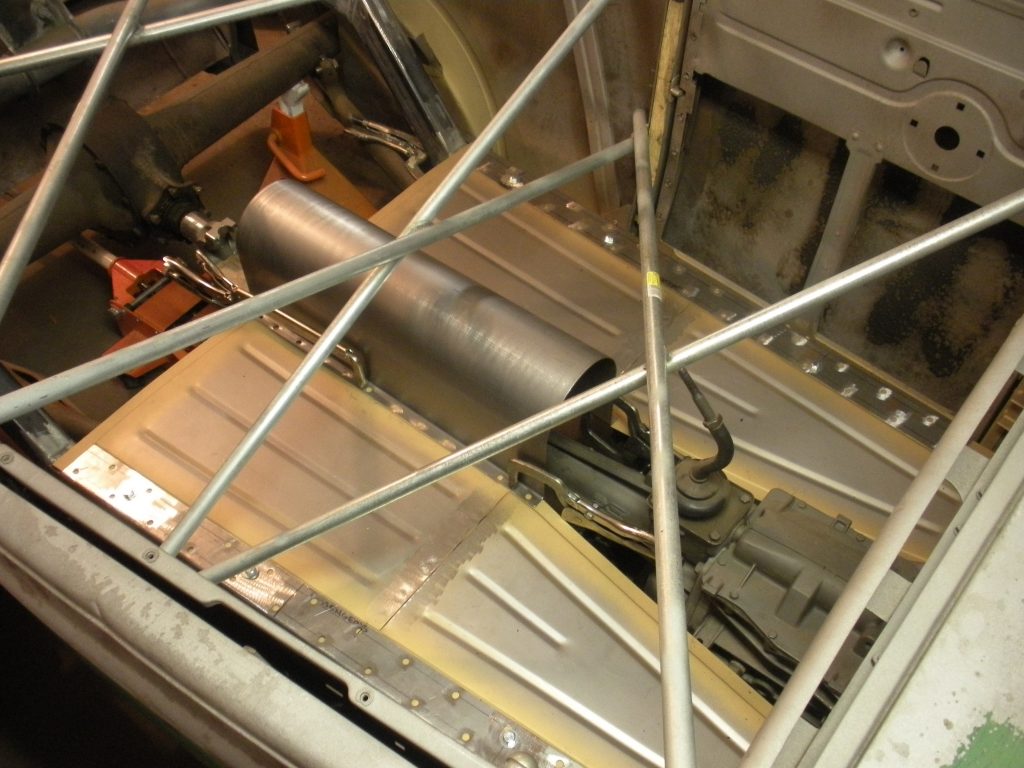 A machine is shown with many metal rods.
