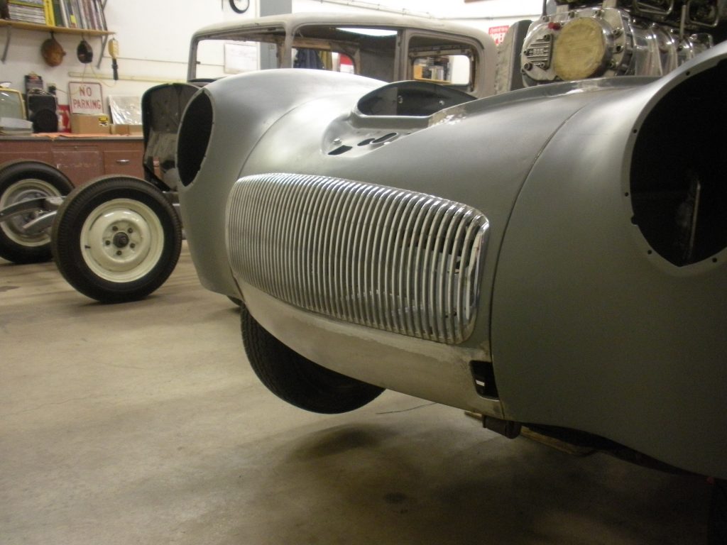 A car that is parked in the garage.