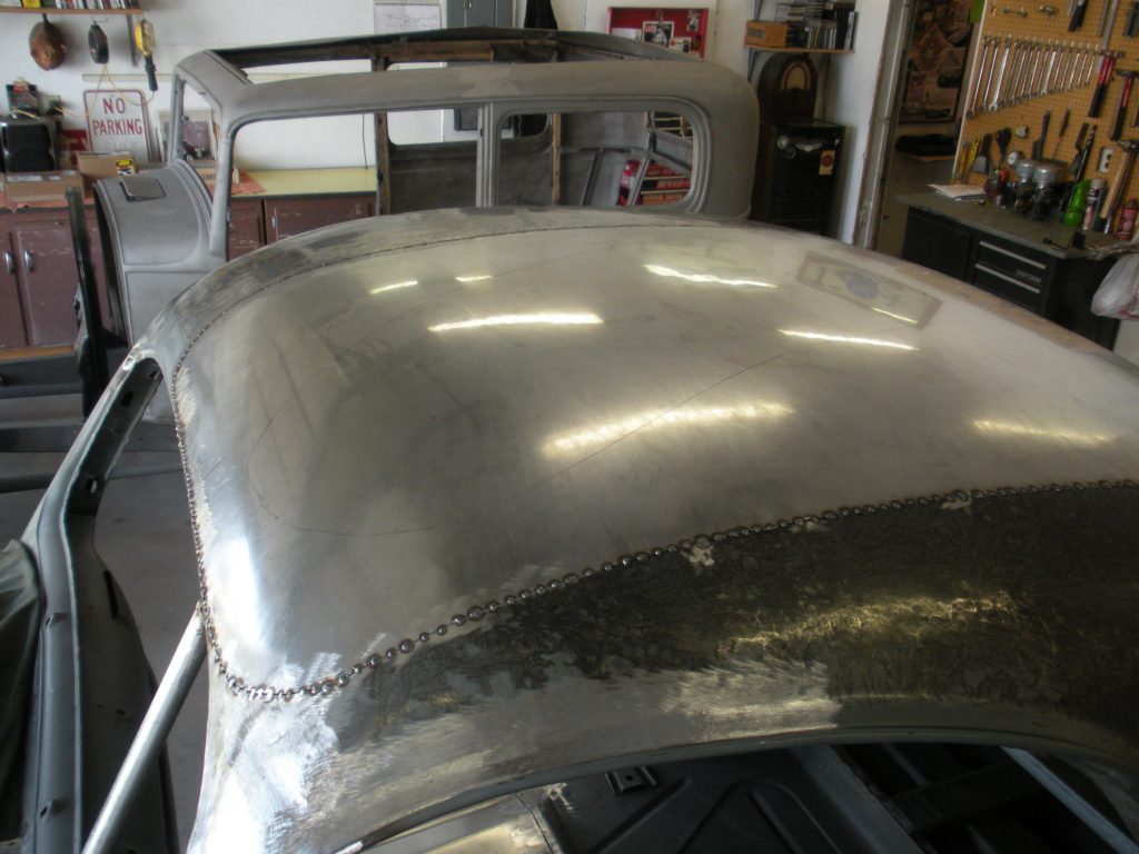 A car that is being worked on in the shop.