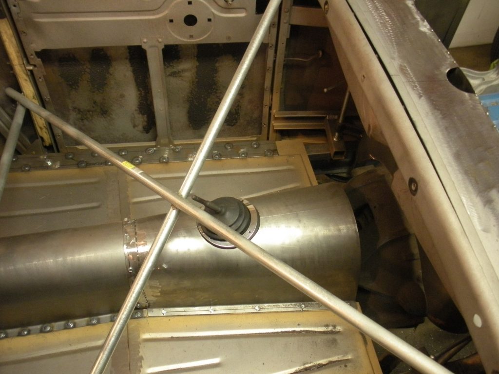 A large metal object sitting in the middle of a room.