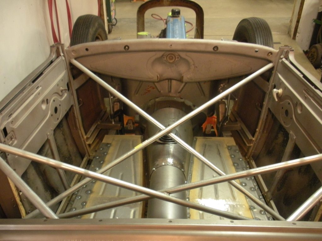 A car with the rear end of it in place.