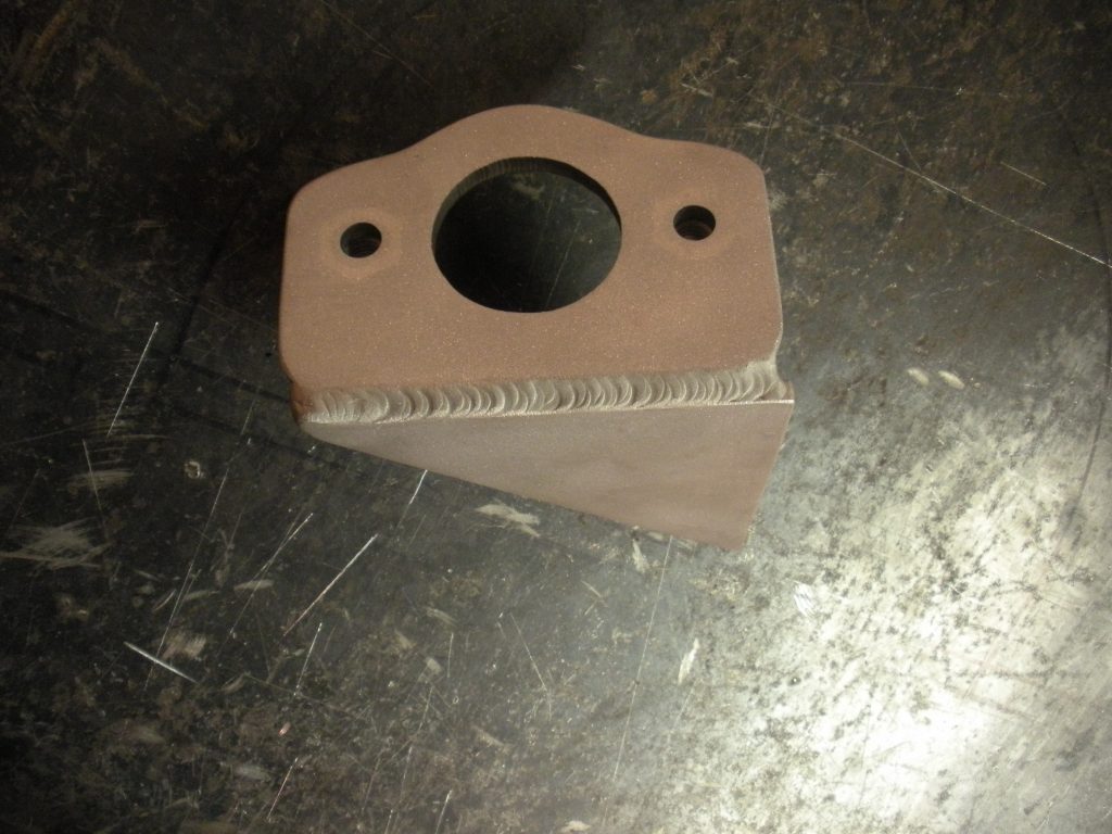 A piece of wood with a hole in it