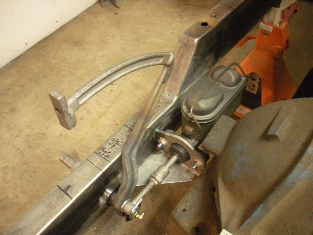 A person working on a metal object.