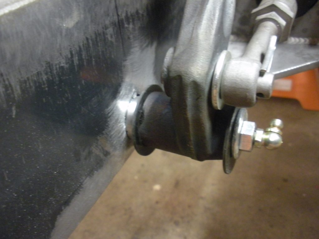A close up of the front wheel bearing on a car.