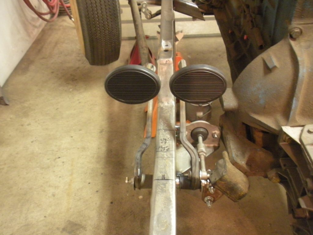 A pair of feet on the back of a motorcycle.