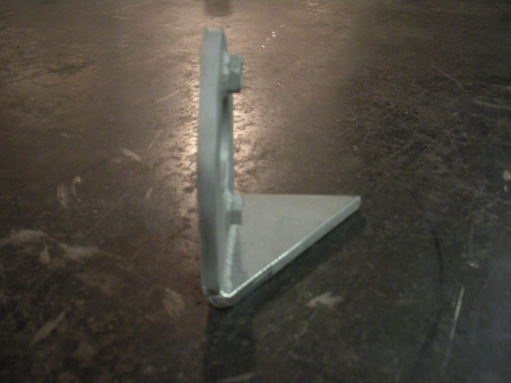A metal object sitting on top of the floor.