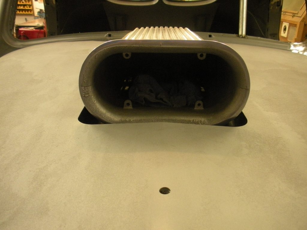 A close up of the exhaust pipe on a car