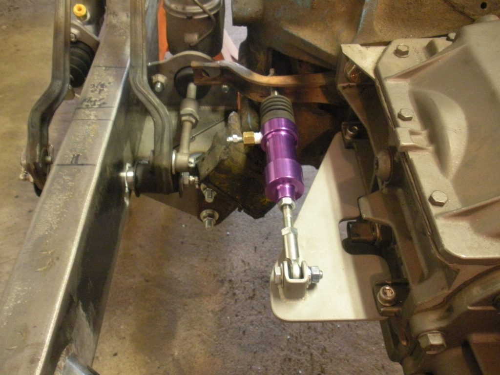 A purple steering column with a white plate