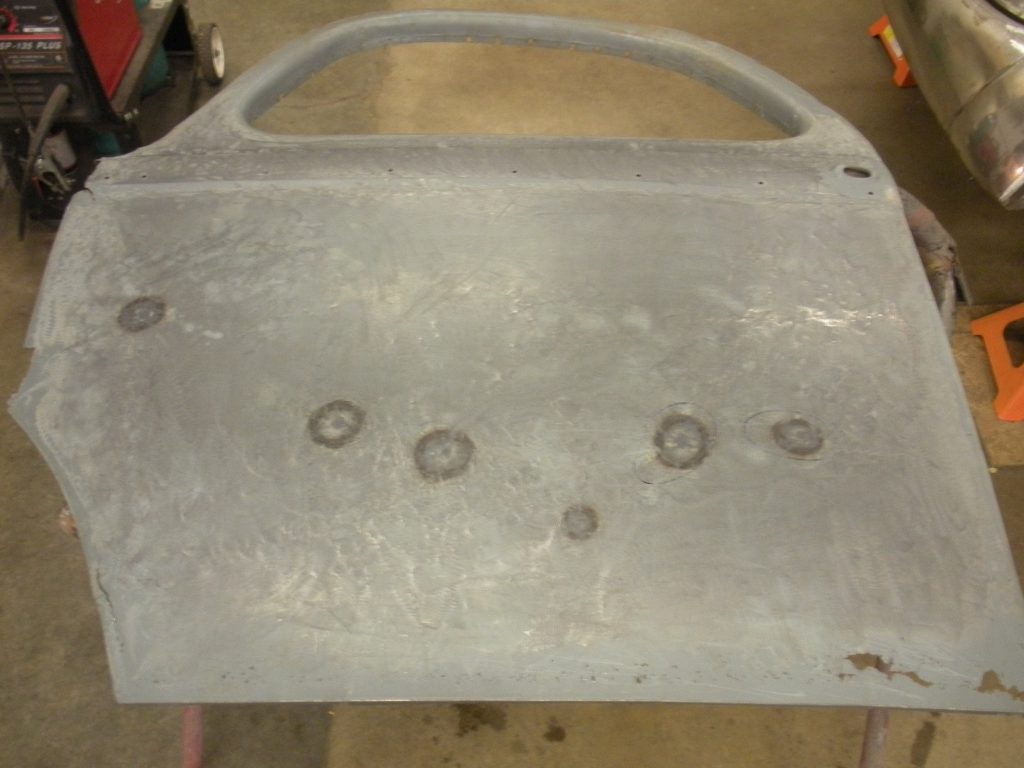 A metal table with holes in it