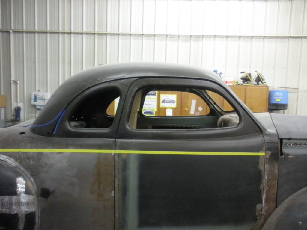 A car that is sitting in the garage.