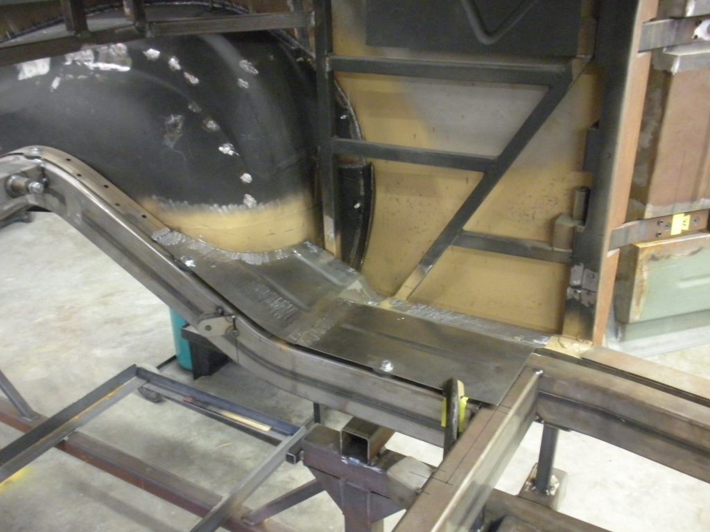 A machine cutting metal with a circular saw.