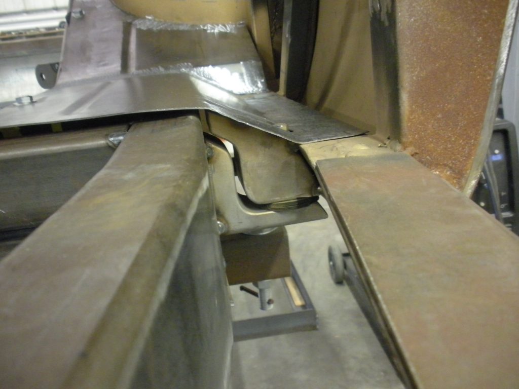 A metal piece of art that is being worked on.