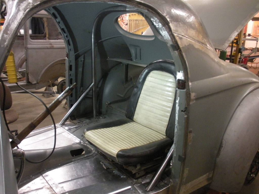 A seat in the back of an airplane.