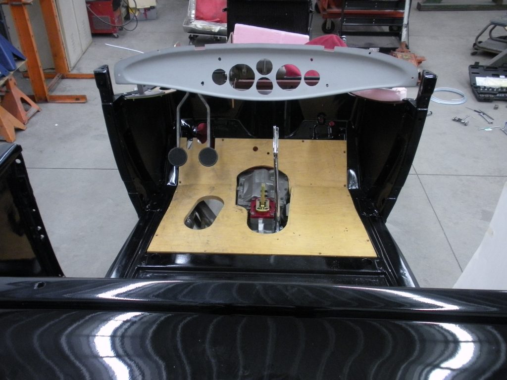 A black car with some controls on it