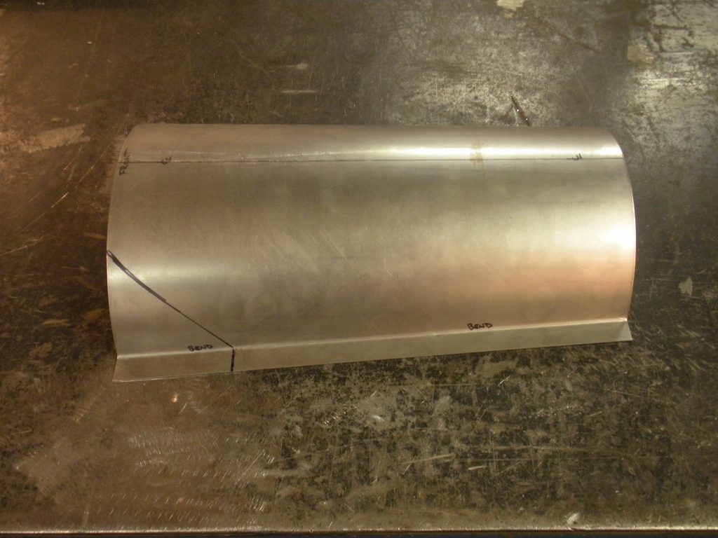 A metal object sitting on top of a floor.