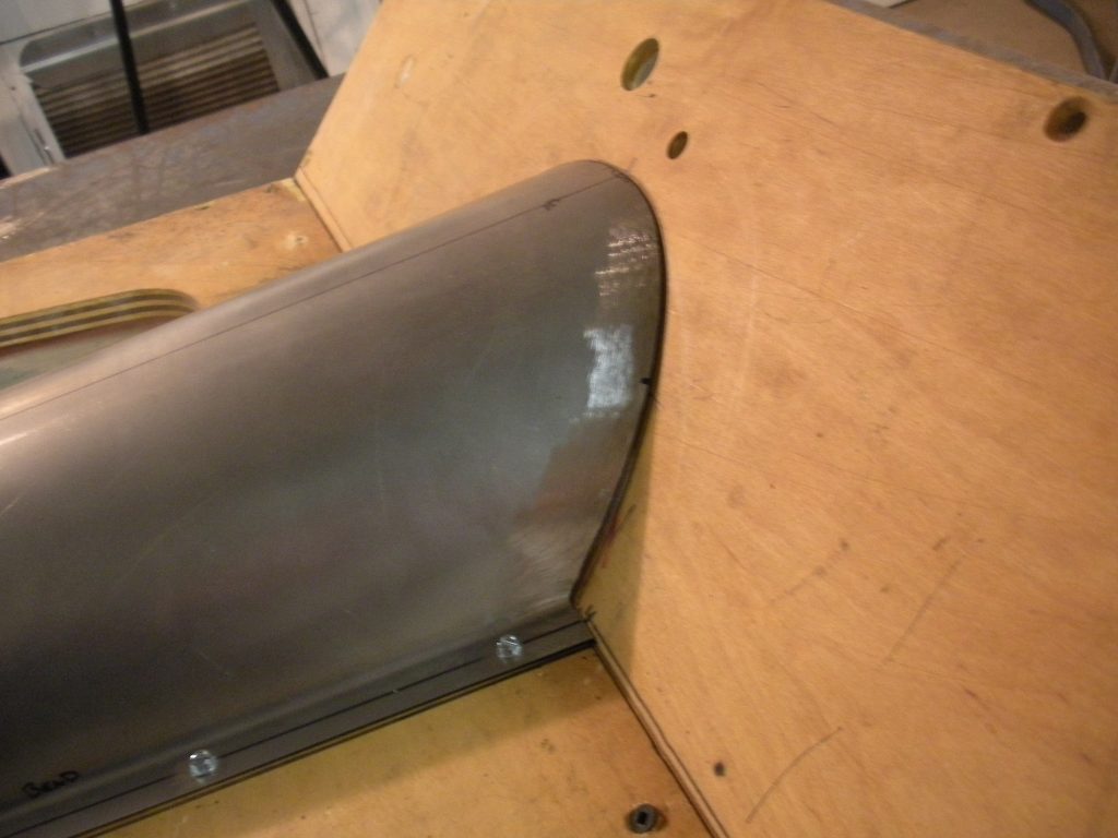 A close up of the side of an airplane wing.