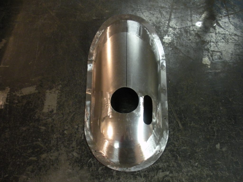 A metal object sitting on top of the floor.