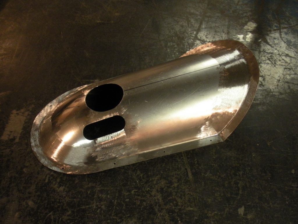 A metal object sitting on top of a floor.