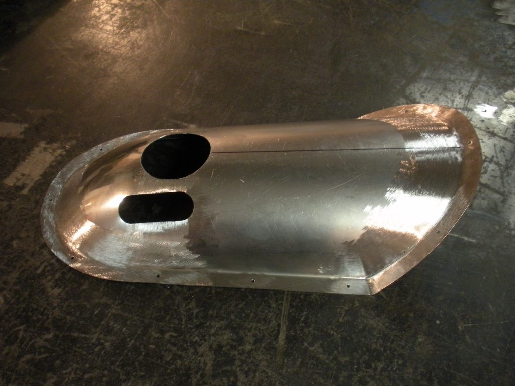 A metal object sitting on top of the floor.