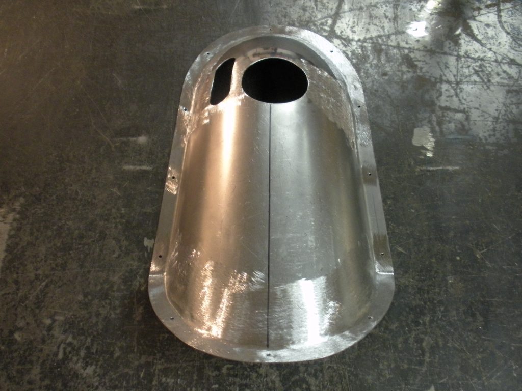 A metal object sitting on top of the floor.