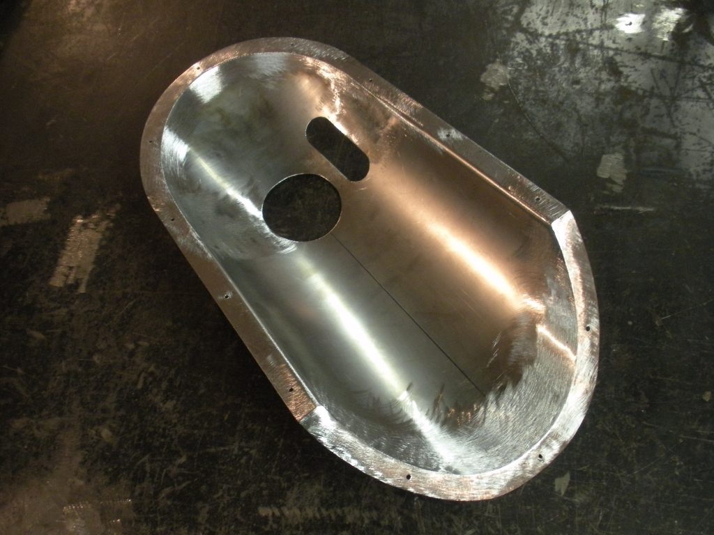 A metal object sitting on top of a table.