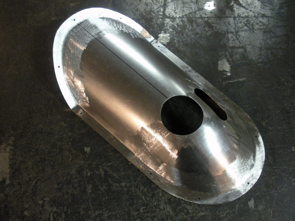 A metal object sitting on top of the floor.
