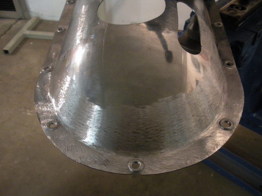 A metal object sitting on top of a floor.