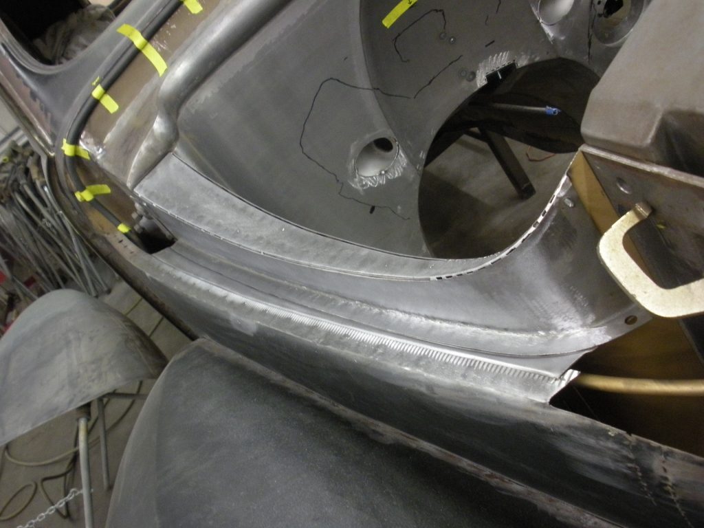 Close-up of car body panel welding.