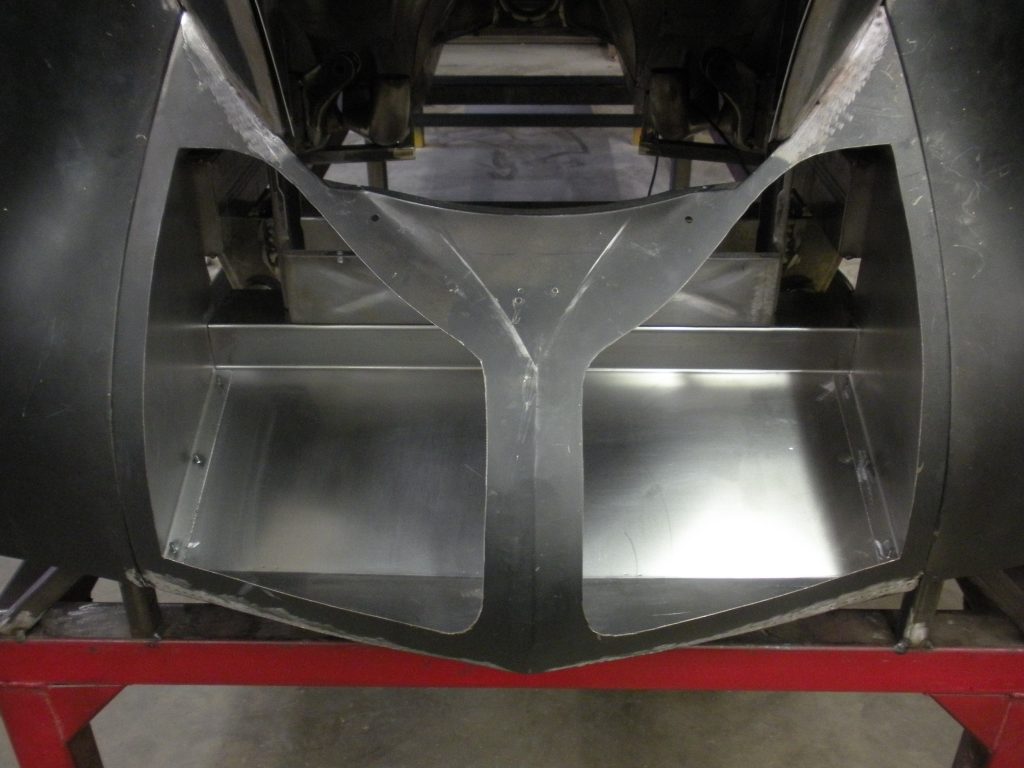 Car bodywork in progress, metal panel.