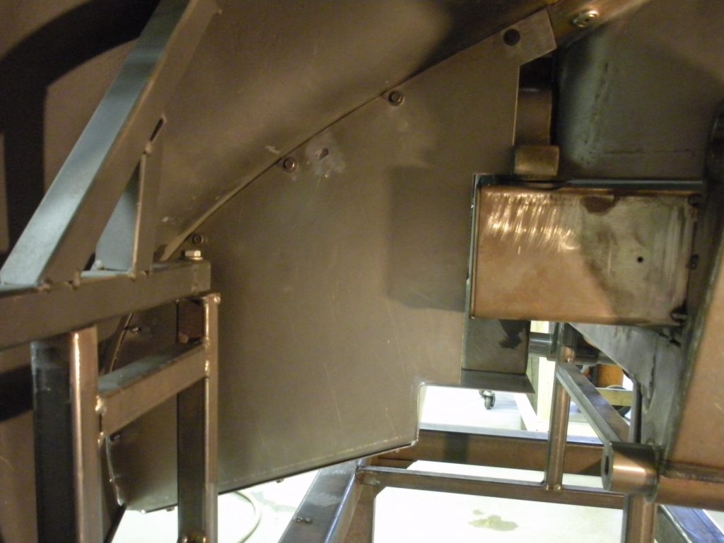 Metal framework with attached panels.