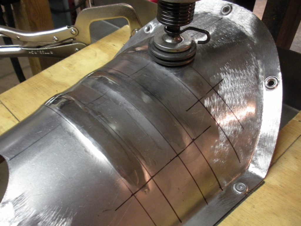 A metal object sitting on top of a table.