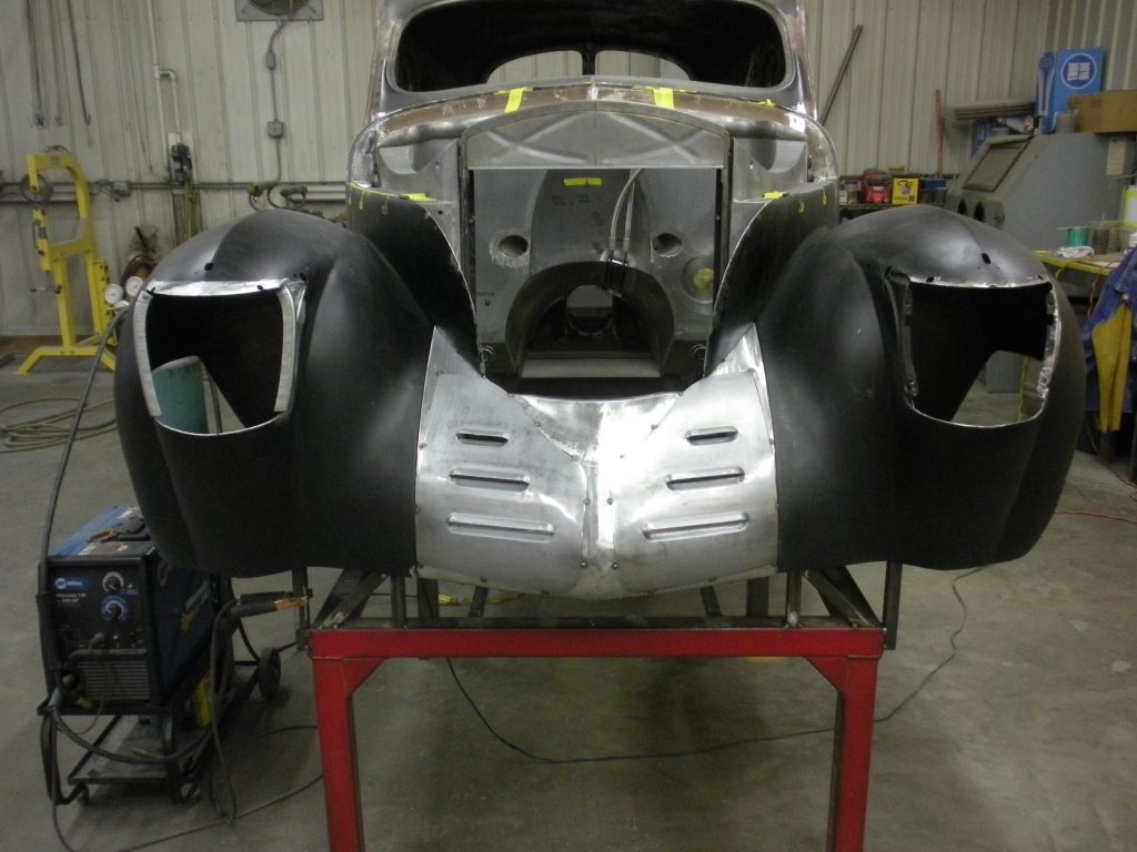 Classic car body under restoration.