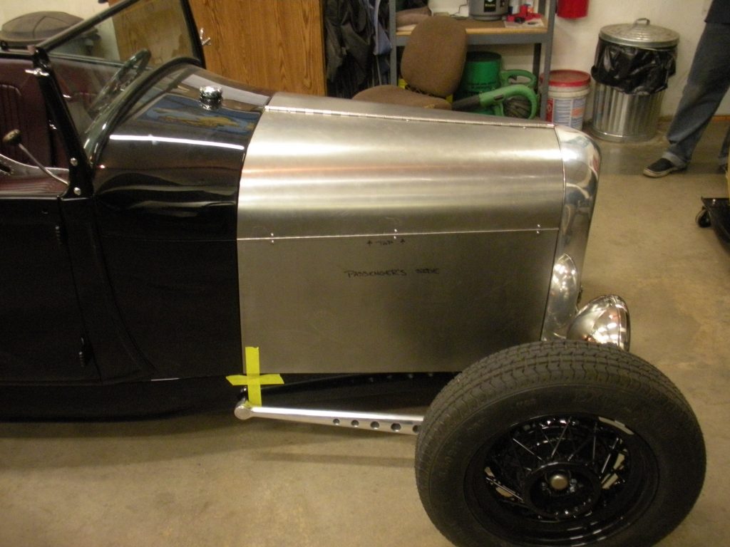 A car that is parked in the garage.