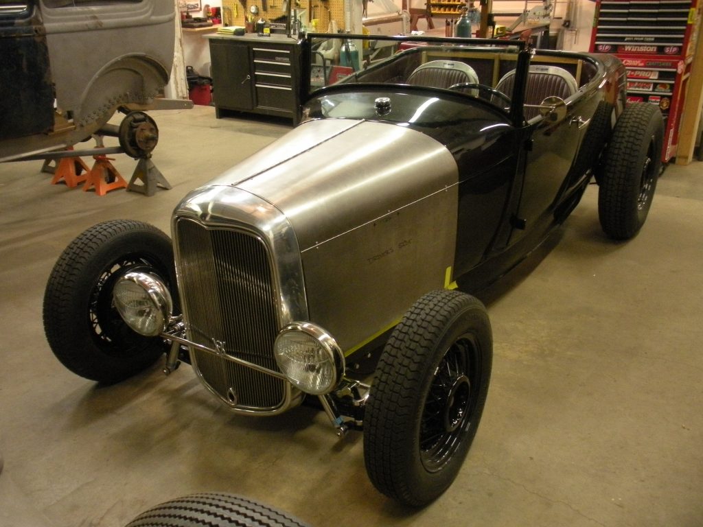 A car that is parked in the garage.