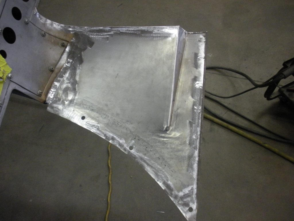 Welded metal car body panel repair.