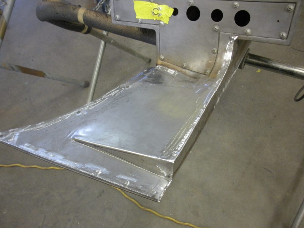 Welded metal car part detail.