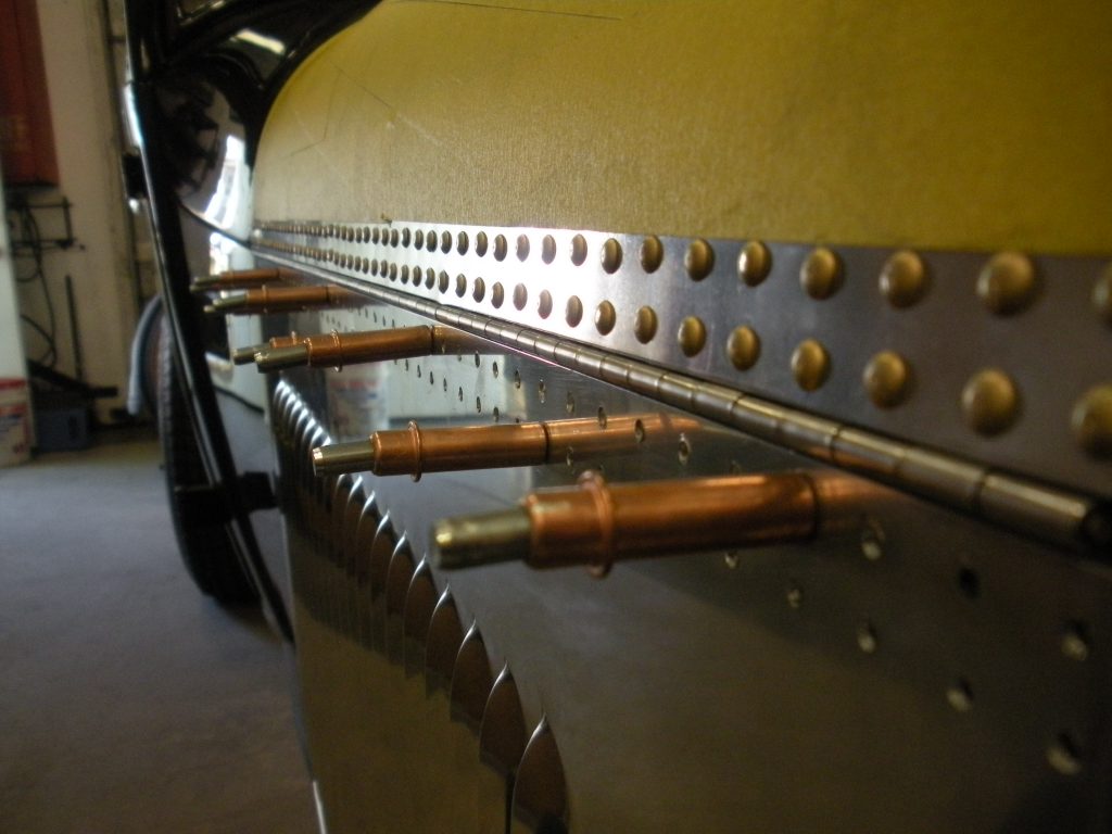 A close up of the blades on an old style machine