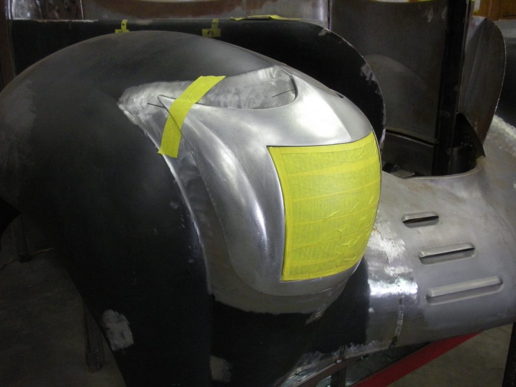 Car body panel repair in progress.