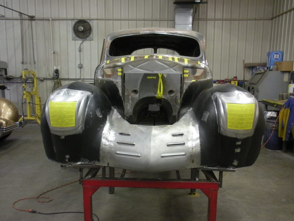 Classic car body under restoration.