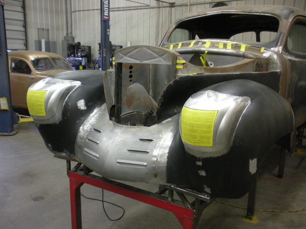 Classic car body under restoration.