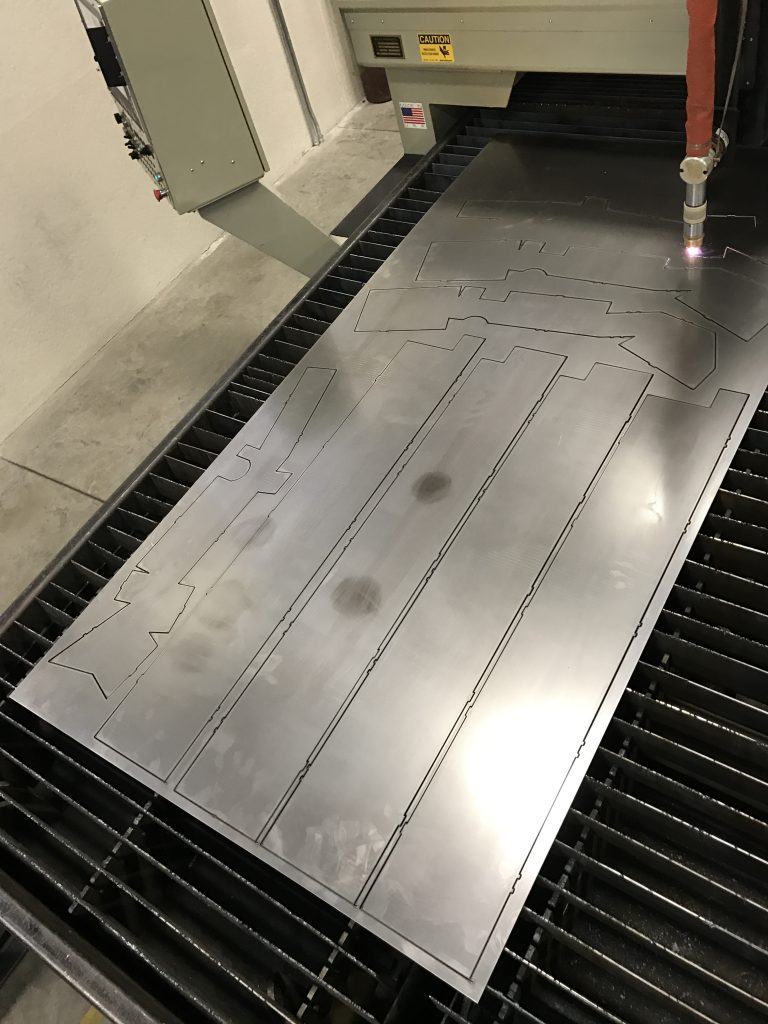 A metal plate that is on top of a table.