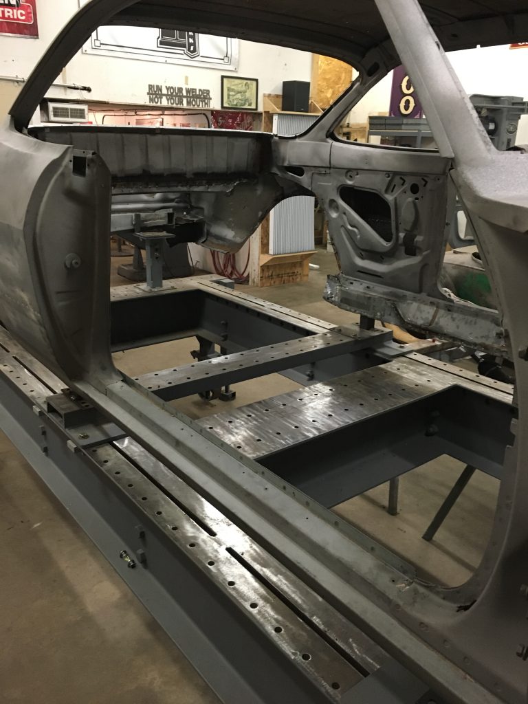 A machine is being worked on in the shop.