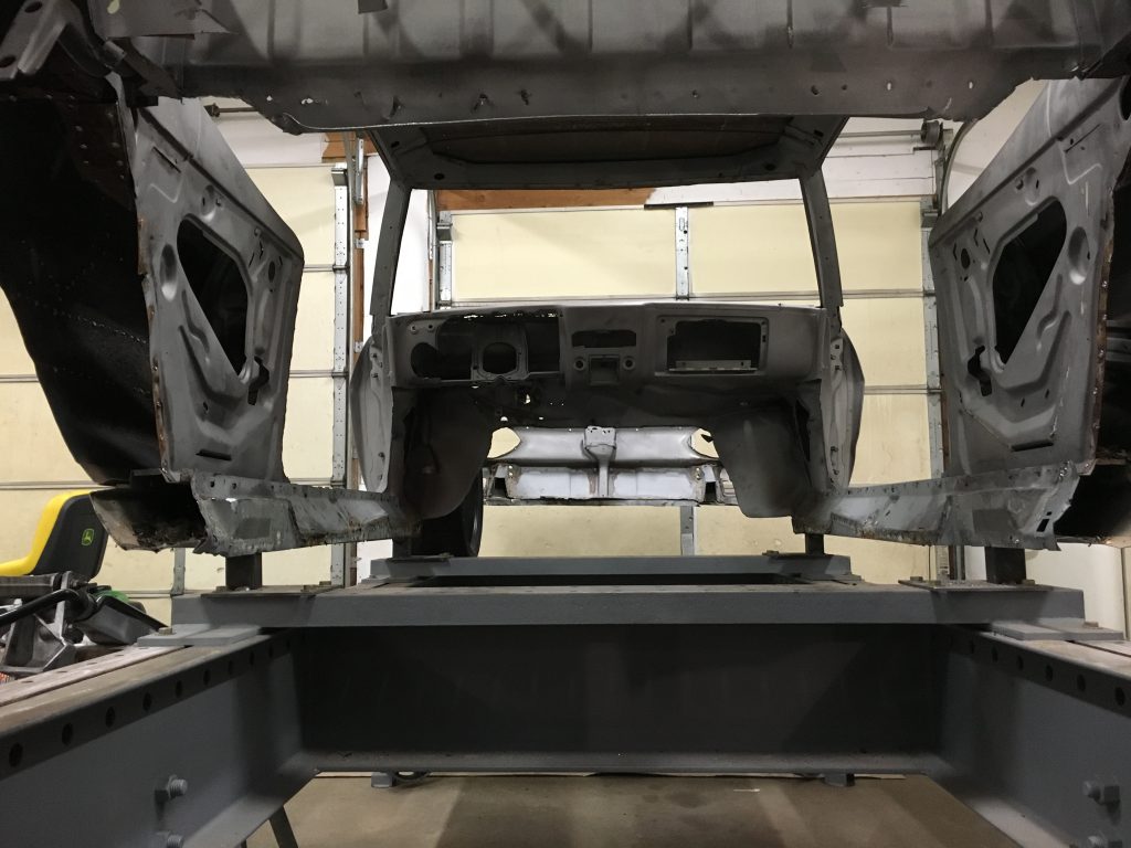 A car frame that is being worked on.