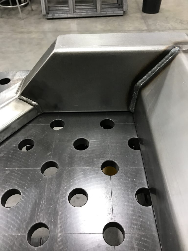 A close up of the bottom part of an oven