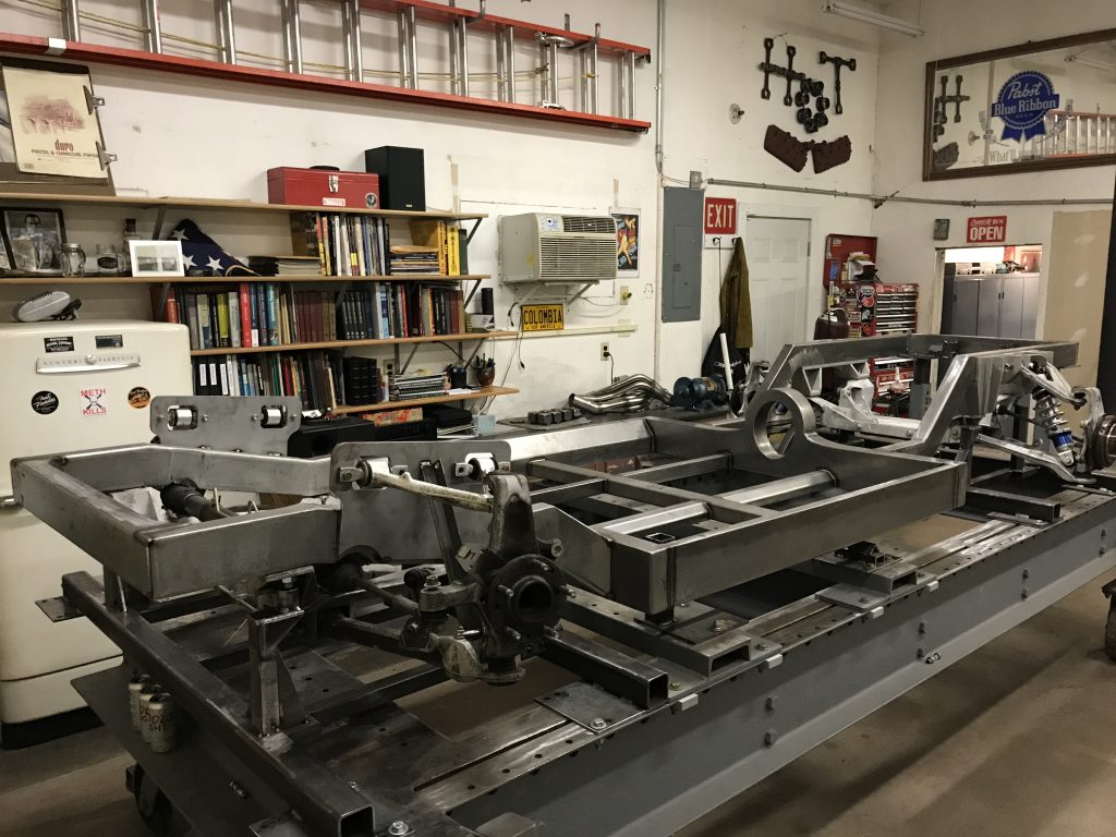 A machine is being worked on in a shop.