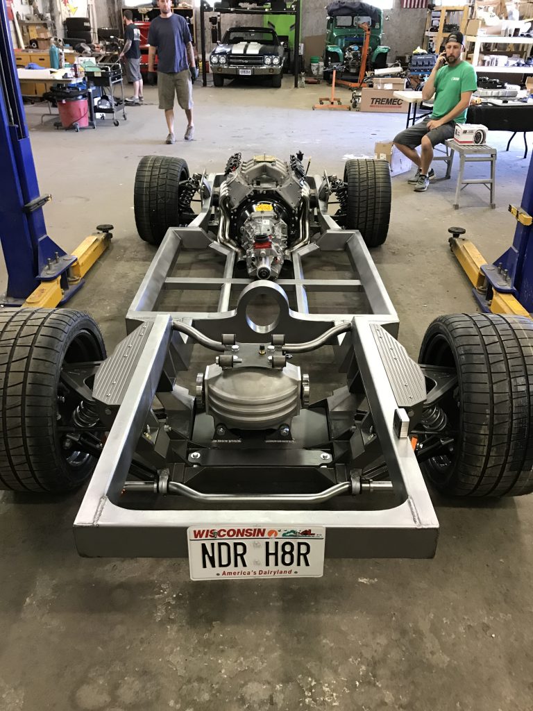 A car frame with the front end in place.