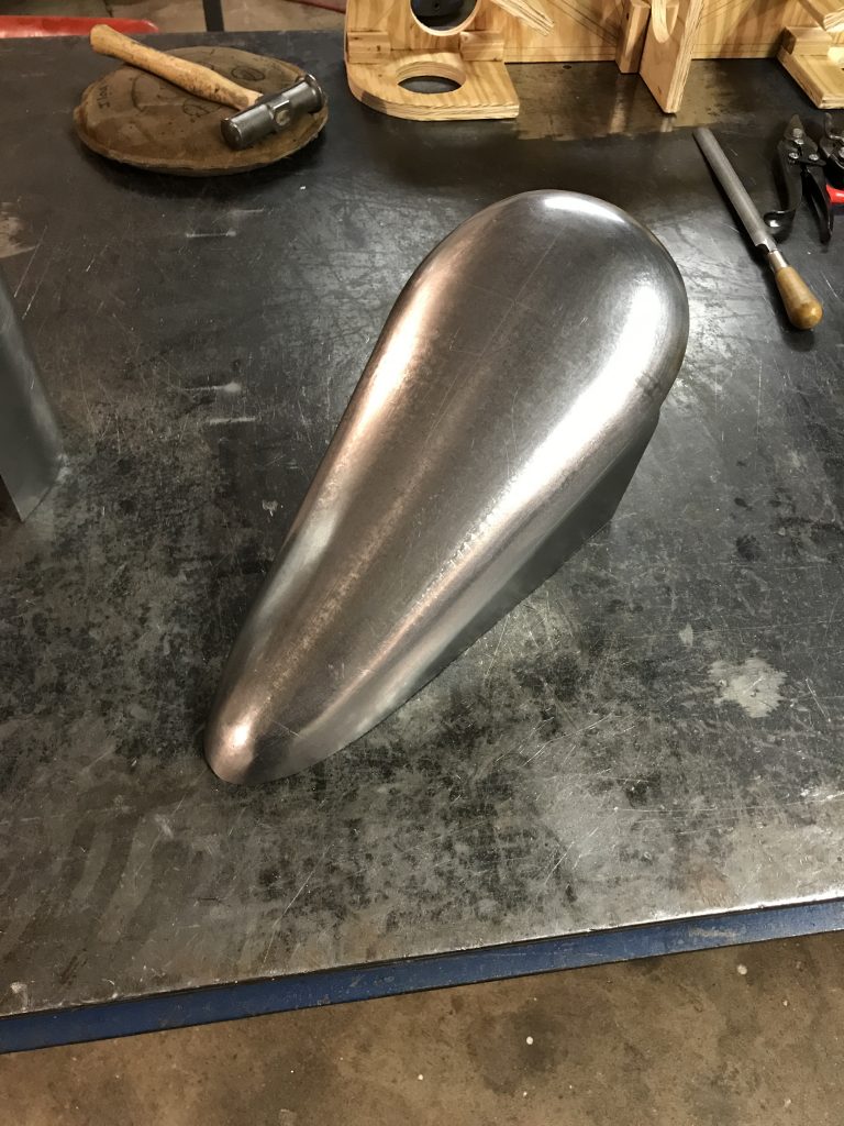 Metal motorcycle gas tank in progress.