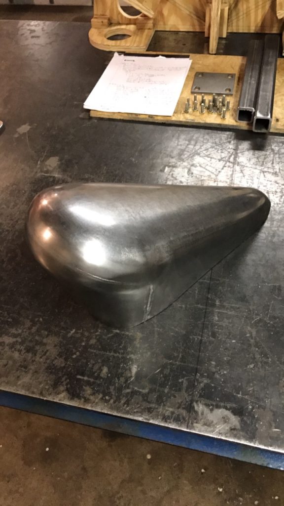 Metal motorcycle gas tank, unfinished.